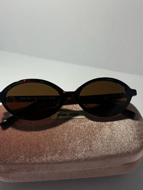 Miu Miu Tortoise Sunglasses with Dark Lenses main image 4